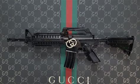 gucci khan firearm|gucci gun meaning.